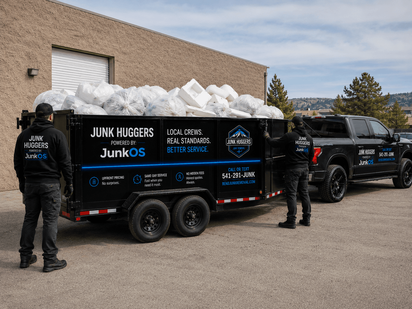 Junk Huggers ultralight pickup with a small load of bags and boxes